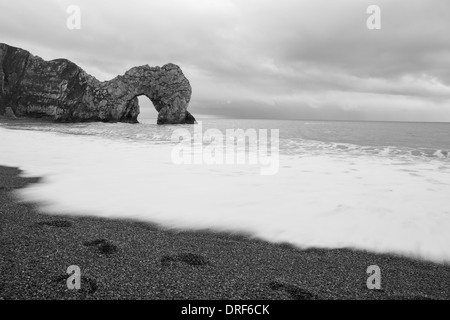 The natural limestone arch of Durdle Door on the Jurassic Coast near Lulworth in Dorset, England. Stock Photo