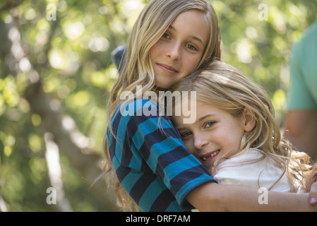 Utah USA children and adults in the shade of woodland Stock Photo