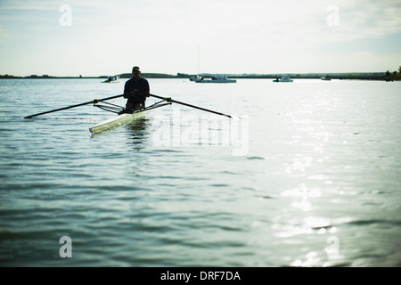 Colorado USA middle-aged man in rowing boat on the water Stock Photo