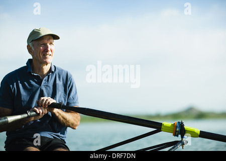Colorado USA middle-aged man rowing single scull rowing boat Stock Photo