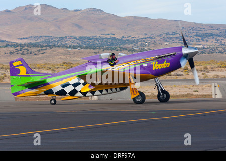 The modified P-51 Mustang Air Racer 'Voodoo' taxies after a heat race in the 2010 National Championship Air Races. Stock Photo