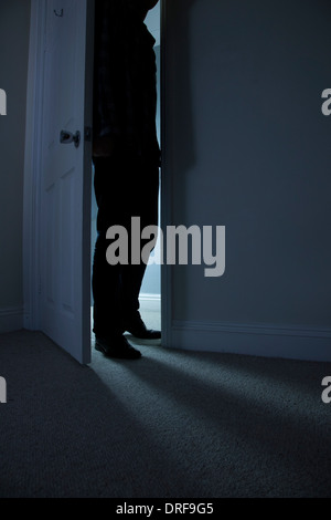 Silhouette of a young male opening a door Stock Photo: 48281736 - Alamy