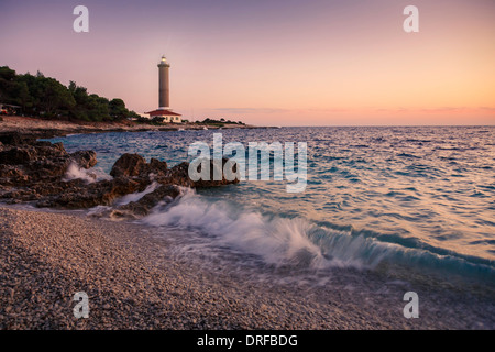 Waves crashing on the beach at sunset, Dugi Otok, Dalmatia, Croatia Stock Photo