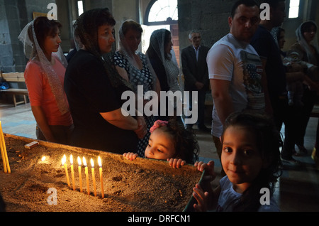Baptism of a child in the Armenian Apostolic Church, The Cathedral of Saint Gregory the Illuminator in Goris, Armenia - Aug 2013 Stock Photo
