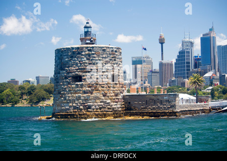 Fort Denison also known as Pinchgut convict prison in Sydney Harbour with CBD skyline Sydney New South Wales NSW Australia Stock Photo