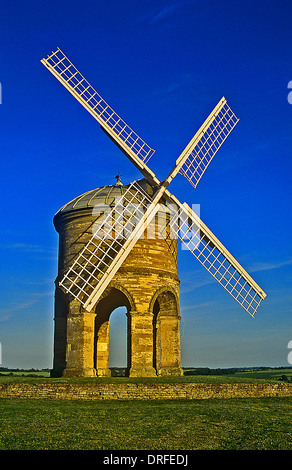 Chesterton Windmill in central Warwickshire, with unique stone arch undercroft and white lattice timber sails. Stock Photo