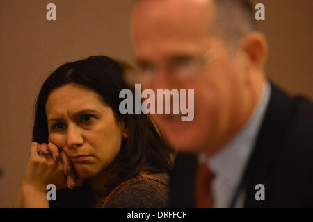 Washington, District of Columbia, US, USA. 24th Jan, 2014. FELICIA ESCOBAR, White House director for immigration and domestic policy, listens to Beverly Hills Mayor JOHN MIRISCH ask a question during the Immigration Reform discussion at the United States Conference of Mayors 82nd Winter Meeting today in the capital. On right is TOM TAIT, Anaheim's Mayor. Credit:  Miguel Juarez Lugo/ZUMAPRESS.com/Alamy Live News Stock Photo
