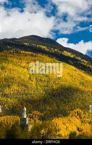 San Juan County Courthouse pokes out below autumn color on Storm Peak, Silverton, Colorado. Stock Photo