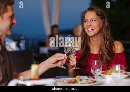 Young couple toasting champagne flutes, Dubrovnik, Croatia Stock Photo