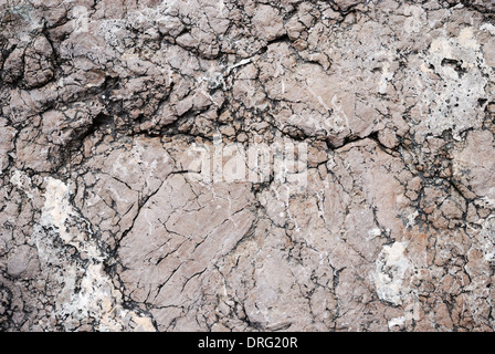Background of the pinkish cracked stone Stock Photo
