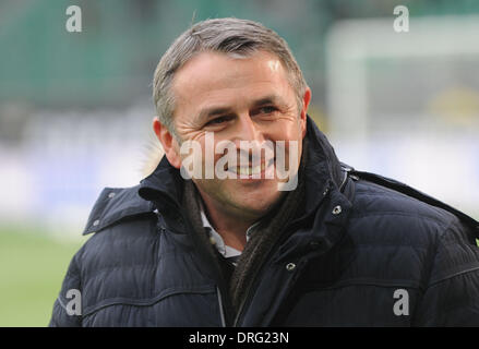 Wolfsburg, Germany. 25th Jan, 2014. Wolfsburg's sports manager Klaus Allofs laughs before the Bundesliga soccer match VfL Wolfsburg vs Hanover 96 at Volkswagen-Arena in Wolfsburg, Germany, 25 January 2014. Photo: Peter Steffen/dpa (ATTENTION: Due to the accreditation guidelines, the DFL only permits the publication and utilisation of up to 15 pictures per match on the internet and in online media during the match.)/dpa/Alamy Live News Stock Photo