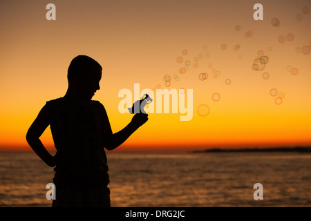 Boy Making Soap Bubbles, Dalmatia, Croatia, Europe Stock Photo