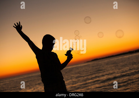 Boy Making Soap Bubbles, Dalmatia, Croatia, Europe Stock Photo