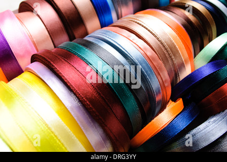 many-coloured ribbon spools in the craft Stock Photo