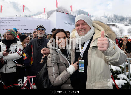 Kitzbuehel, Austria. 25th Jan, 2014. Musician Gerry Friedle (DJ Oetzi) and his wife Sonja pose during the annual Austrian downhill ski race Hahnenkamm race in Kitzbuehel, Austria, 25 January 2014. Photo: Felix Hoerhager/dpa/Alamy Live News Stock Photo
