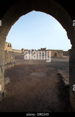 Ruins of Qasr al-Azraq built by the Ayyubids in the 13th century using locally quarried basalt located in the province of Zarqa Governorate in central-eastern Jordan Stock Photo