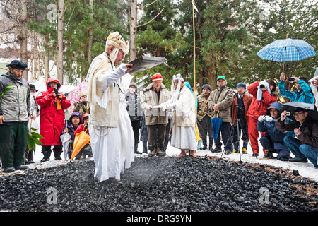 Shinto priest fire walking. Stock Photo