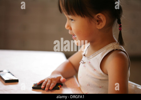 child profile looking in front of her Stock Photo