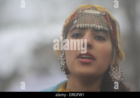 Jan. 26, 2014 - Srinagar, Kashmir, India, A Kashmiri muslim school girl dressed in traditional outfits sing during the India's 65nd Republic Day during parade in srinagar, the summer capital of indian kashmir on 26/1/2014, India celebrated its 64nd Republic Day under heavy security, with tensions running high in Kashmir over efforts by Hindu nationalists to hold a rally in the troubled region's state capital (Credit Image: © Altaf Zargar/ZUMAPRESS.com) Stock Photo