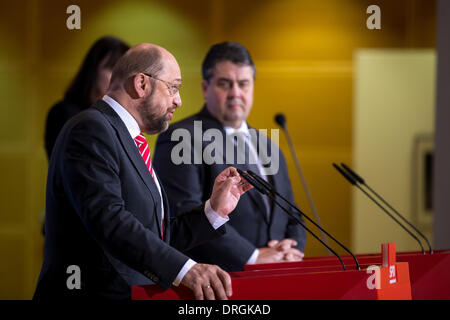 Berlin, Germany. 25th Jan, 2014. After the SPD party Managers meeting, Sigmar Gabriel (SPD Chef) and Martin Schulz ( President of the European Parliament) give press statement on ''SPD Europa delegates Conference'' and on the ''extraordinary National Party Congress of the SPD'' (that will be realized on next day) at SPD headquarter in Berlin. / Picture: Sigmar Gabriel (SPD), SPD Party Chef and German Minister of Economy and Energy, and Martin Schulz (SPD), President of the European Parliament and Executive of the SPD Officer for the European Union, during the press statement in Berlin. Stock Photo