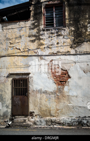 Crumbling brickwork on a building in the historic district of George Town, Penang, Malaysia Stock Photo