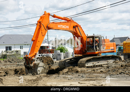 New Hitachi mechanical digger at work Stock Photo
