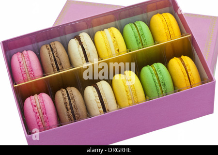 Multicoloured macaroon biscuits in pink box. Stock Photo