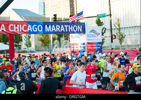 Participants in the Bank of America Chicago Marathon run down Columbus Drive on October 13, 2013. Stock Photo