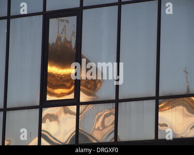 Lugansk, Ukraine. 26th Jan, 2014. Resfex of Our Lady of Tenderness temple in the window.   Tonight frosts in eastern Ukraine reached -29 degrees Celsius. In the coming days is expected a slight warming. Credit:  Igor Golovnov/Alamy Live News Stock Photo