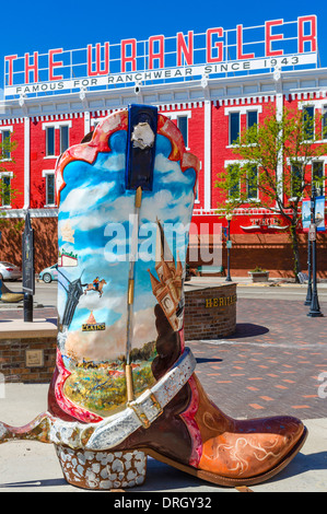 Giant cowboy boot and The Wrangler store in Cheyenne Depot Plaza, historic downtown Cheyenne, Wyoming, USA Stock Photo