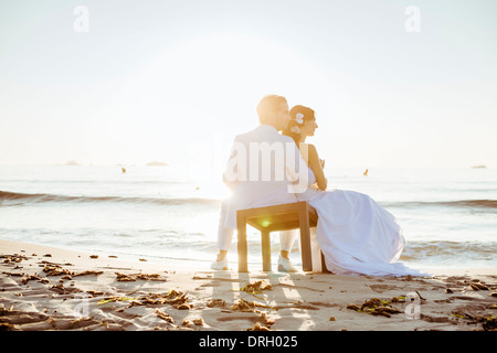 Brautpaar am Strand auf Ibiza, Spanien - bridal couple at the Beach, Ibiza, Spain Stock Photo