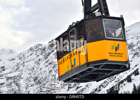 Nebelhorn or Nebelhornb Cable Car in winter taking skiers and tourists from the town of Oberstdorf in Bavaria, Germany through three stages to the top Stock Photo