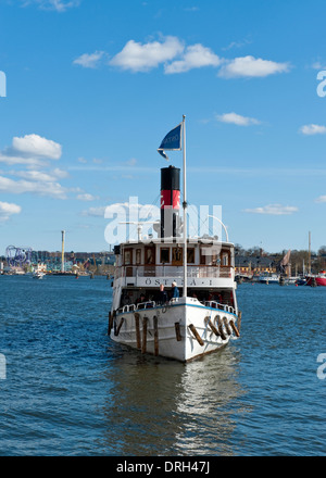 Tourist steamboat in Stockholm, Sweden. With Djurgårdsvägen island in the background. Stock Photo