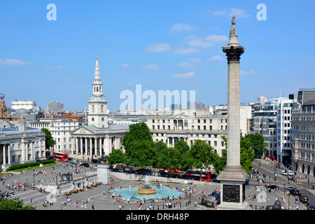 Aerial view looking down on tourists in Trafalgar Square water feature fountain & St Martin-in-the-Fields church with historical Nelsons Column UK Stock Photo