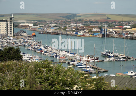 Newhaven, East Sussex, UK. Marina and River Ouse. South Downs in the background. Ferry goes to Dieppe. Stock Photo