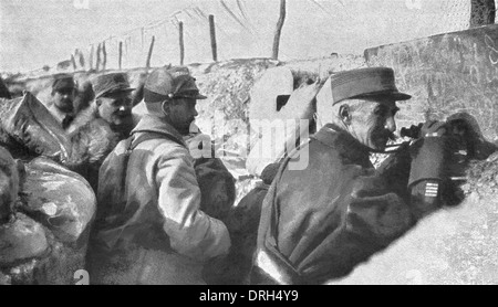 Allied soldiers in the trenches watch for enemy German soldiers during World War I. Stock Photo