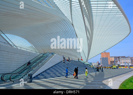 Exterior of futuristic shape modern glass ceiling & roof covering train station & entrance at Liege Belgium public transport infrastructure building Stock Photo