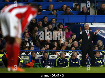 London, Stoke City gives instructions during FA Cup Fourth Round match between Chelsea and Stoke City at Stamford Bridge Stadium in London, UK. 26th Jan, 2014. Mark Hughes(R), manager of Stoke City gives instructions during FA Cup Fourth Round match between Chelsea and Stoke City at Stamford Bridge Stadium in London, Britain on Jan. 26, 2014. Stoke City lost 0-1. Credit:  Wang Lili/Xinhua/Alamy Live News Stock Photo