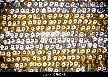 background made of golden and silver sequins fabric Stock Photo