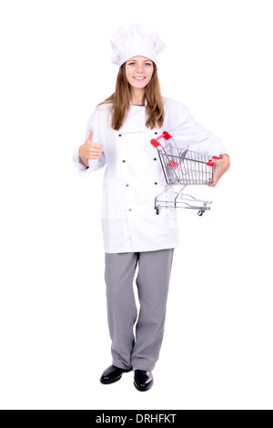 Young chef with small shopping cart isolated in white Stock Photo