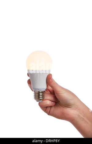 Hand holding bright led light bulb on white background Stock Photo