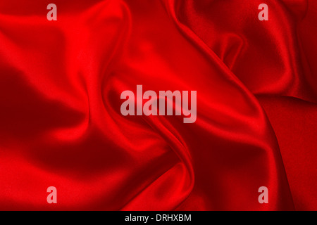 Background of red satin fabric. Shiny silk backdrop Stock Photo - Alamy