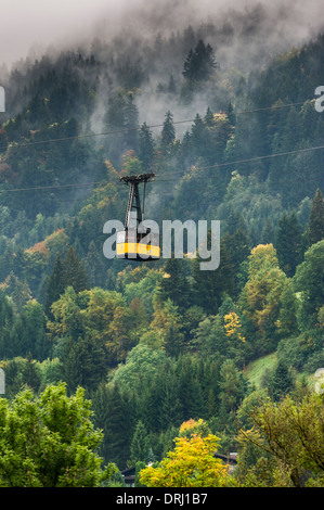 nebelhorn cable car against misty landscape, oberstdorf, bavaria, germany Stock Photo