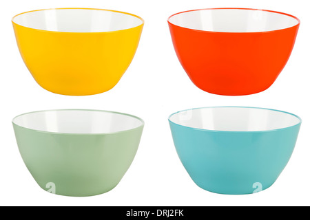 Green, blue, yellow, red plastic bowls isolated on white background Stock Photo