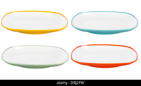 Green, blue, yellow, red plastic plates isolated on white background Stock Photo