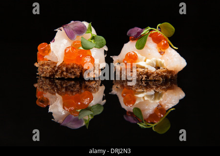 fresh salmon, cheese, and herbs canapes, Japanese meal, healthy food concept Stock Photo