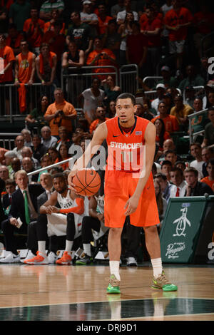 Coral Gables, Florida, USA. 25th Jan, 2014. Tyler Ennis #11 of Syracuse in action during the NCAA basketball game between the Miami Hurricanes and the Syracuse Orange in Coral Gables, Florida. The Orange defeated the 'Canes 64-52. © csm/Alamy Live News Stock Photo