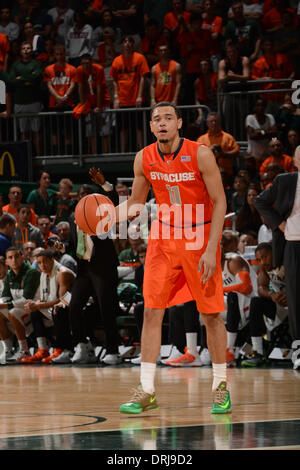 Coral Gables, Florida, USA. 25th Jan, 2014. Tyler Ennis #11 of Syracuse in action during the NCAA basketball game between the Miami Hurricanes and the Syracuse Orange in Coral Gables, Florida. The Orange defeated the 'Canes 64-52. © csm/Alamy Live News Stock Photo