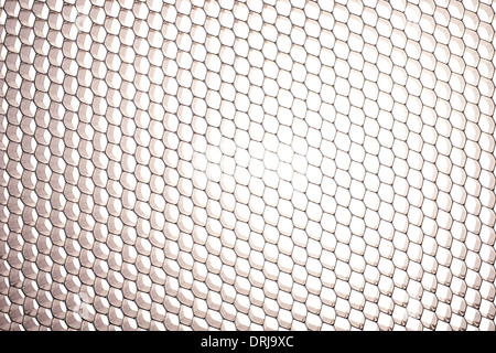 Honeycomb grid against white background Stock Photo