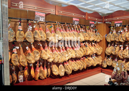 Supermarket display of jamones (hams) in Huelva, Andalusia, Spain. Stock Photo